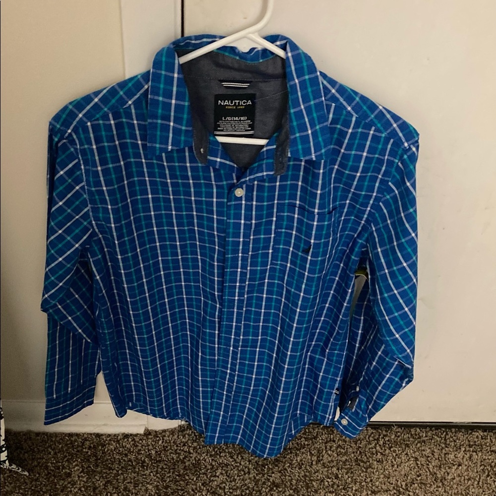 Boy’s Nautica blue plaid button down shirt. Size L